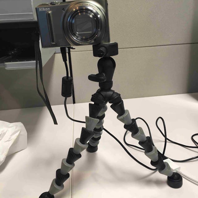 Nikon Coolpix Camera + Tripod